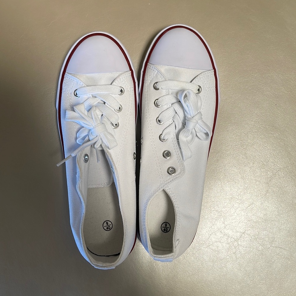 never worn!!! Brand new white canvas sneakers size 9